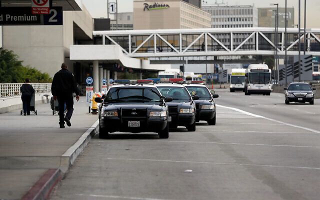 Illustrative: Police at Los Angeles International Airport, January 21, 2014. (AP Photo/Reed Saxon)