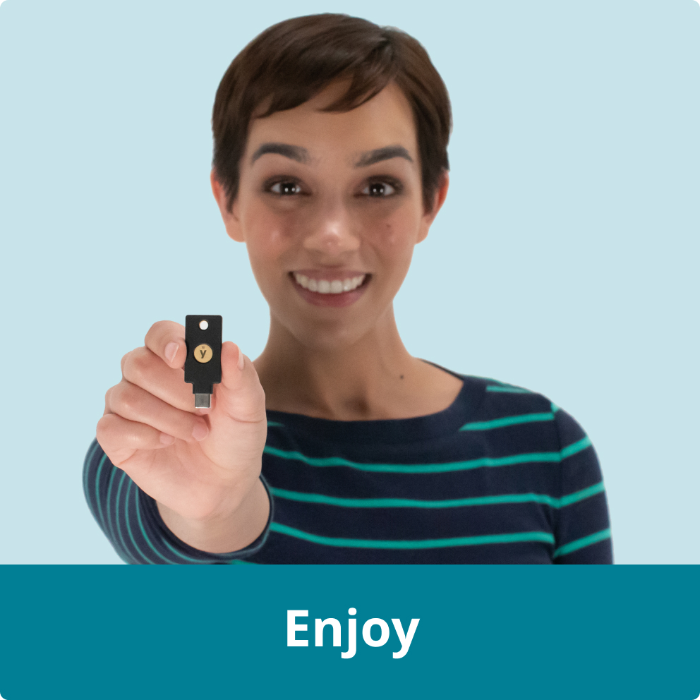 Woman holding a YubiKey