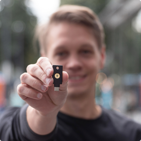 Man holding YubiKey