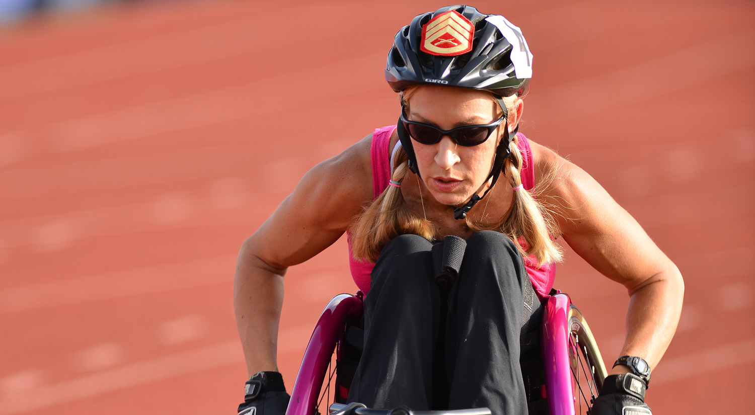 Female Veteran using a handcycle