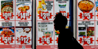 Prices are displayed on a grocery store in New York on Feb. 1, 2023.