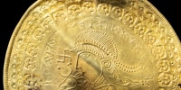 Scientists have identified the oldest-known reference to the Norse god Odin on a gold disc unearthed in western Denmark.