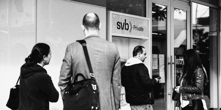 Customers outside a Silicon Valley Bank branch in Beverly Hills, Calif., on March 13, 2023.