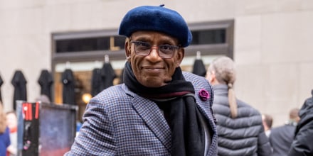 al roker in a blue hat and scarf outside on street of nYC