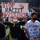 Members and supporters of the Asian-American community attend a "rally against hate" at Columbus Park in New York City on March 21, 2021. - Three massage parlors around Atlanta were targeted March 16, 2021, and a 21-year-old suspect was arrested. Robert Aaron Long faces eight counts of murder and one charge of aggravated assault.