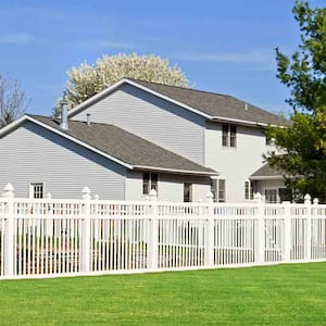 GRAY HOUSE WITH VINYL FENCE 