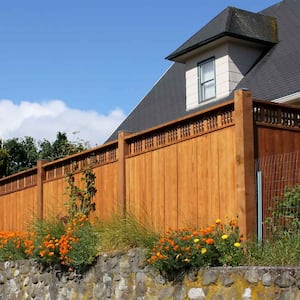 House exterior with wooden privacy fence