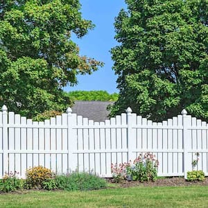 white vinyl fence in backyard