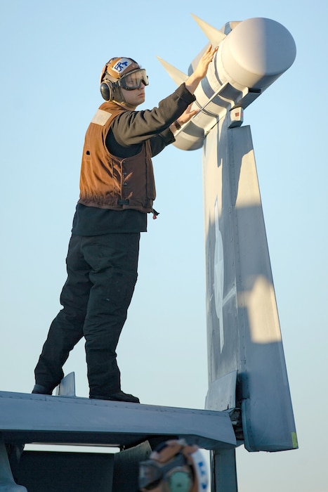 A Sailor from VAQ-142 maintains aircraft aboard USS Gerald R. Ford (CVN 78) in the Atlantic Ocean.