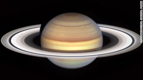 NASA&#39;s Hubble Space Telescope has observation time devoted to Saturn each year, thanks to the Outer Planet Atmospheres Legacy (OPAL) program, and the dynamic gas giant planet always shows us something new. This latest image heralds the start of Saturn&#39;s &quot;spoke season&quot; with the appearance of two smudgy spokes in the B ring, on the left in the image.
The shape and shading of spokes varies—they can appear light or dark, depending on the viewing angle, and sometimes appear more like blobs than classic radial spoke shapes, as seen here. The ephemeral features don&#39;t last long, but as the planet&#39;s autumnal equinox approaches on May 6, 2025, more will appear. Scientists will be looking for clues to explain the cause and nature of the spokes. It&#39;s suspected they are ring material that is temporarily charged and levitated by interaction between Saturn&#39;s magnetic field and the solar wind, but this hypothesis has not been confirmed.