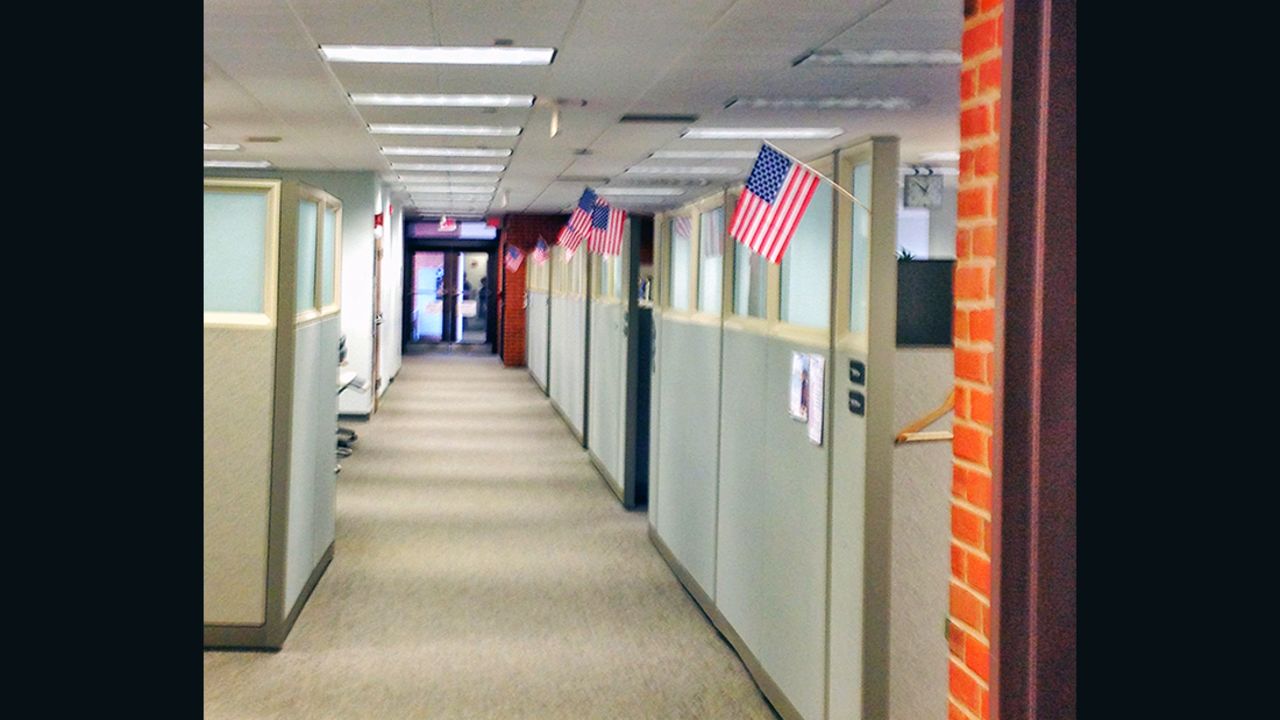 Northeast Utilities employees put up US flags in cubicles after realizing they would lose their jobs to H-1B workers.