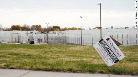 Now hiring signs line the street outside the CoreCivic-owned Leavenworth Detention Center.