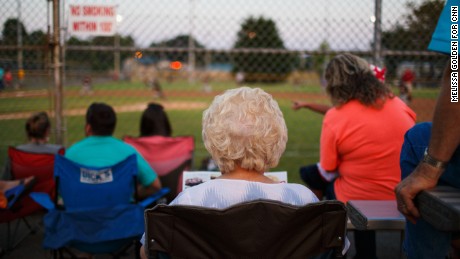 Residents watch a little league game between the Cubs and the Marlins at the Albertville Parks and Recreation Complex.