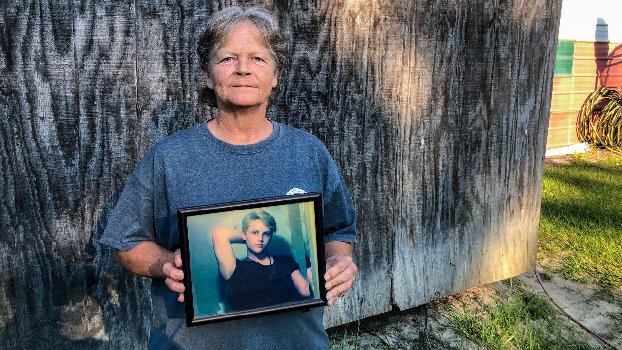 Sandy Smith holds a photo of her late son, 19-year-old Stephen Smith, on Thursday, June 24, 2021.