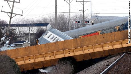 Multiple cars of a Norfolk Southern train lie toppled on one another after derailing at a train crossing with Ohio 41 in Clark County, Ohio, Saturday, March 4, 2023.