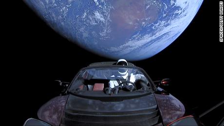 IN SPACE - FEBRUARY 8 2018: In this handout photo provided by SpaceX, a Tesla roadster launched from the Falcon Heavy rocket with a dummy driver named &quot;Starman&quot;  heads towards Mars. (Photo by SpaceX via Getty Images)