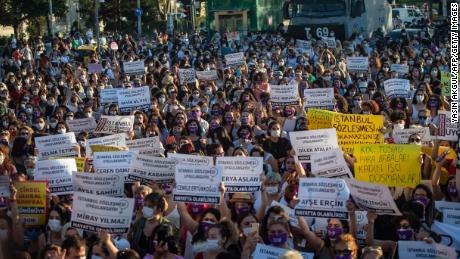 Demonstrators wearing protective face masks hold up placards with names of women during a demonstration for a better implementation of the Istanbul Convention and the Turkish Law 6284 for the protection of the family and prevention of violence against women, in Istanbul, Turkey, on August 5, 2020. - Thousands of women in Turkey took to the streets on August 5 to demand that the government does not withdraw from a landmark treaty on preventing domestic violence. (Photo by Yasin AKGUL / AFP) (Photo by YASIN AKGUL/AFP via Getty Images)