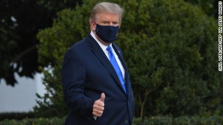 US President Donald Trump walks to Marine One prior to departure from the South Lawn of the White House in Washington, DC, October 2, 2020, as he heads to Walter Reed Military Medical Center, after testing positive for Covid-19. - President Donald Trump will spend the coming days in a military hospital just outside Washington to undergo treatment for the coronavirus, but will continue to work, the White House said Friday (Photo by SAUL LOEB / AFP) (Photo by SAUL LOEB/AFP via Getty Images)