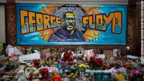 MINNEAPOLIS , MINNESOTA - MAY 31: The makeshift memorial and mural outside Cup Foods where George Floyd was murdered by a Minneapolis  police officer on Sunday, May 31, 2020 in Minneapolis , Minnesota. (Jason Armond/Los Angeles Times via Getty Images)