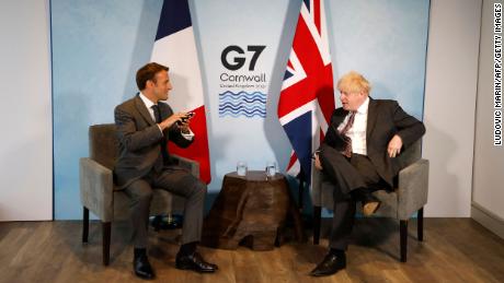 Britain&#39;s Prime Minister Boris Johnson and France&#39;s President Emmanuel Macron take part in a bilateral meeting during the G7 summit in Carbis bay, Cornwall on June 12, 2021. (Photo by Ludovic MARIN / AFP) (Photo by LUDOVIC MARIN/AFP via Getty Images)