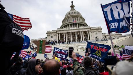 WASHINGTON, DC - JANUARY 06: Pro-Trump supporters storm the U.S. Capitol following a rally with President Donald Trump on January 6, 2021 in Washington, DC. Trump supporters gathered in the nation&#39;s capital today to protest the ratification of President-elect Joe Biden&#39;s Electoral College victory over President Trump in the 2020 election. (Photo by Samuel Corum/Getty Images)