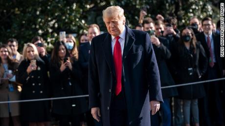 Trump turns to reporters as he exits the White House to walk toward Marine One on the South Lawn on January 12, 2021 in Washington, DC. 