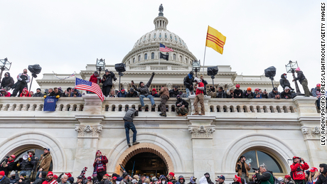 Protesters seen all over Capitol building where pro-Trump supporters riot and breached the Capitol. 