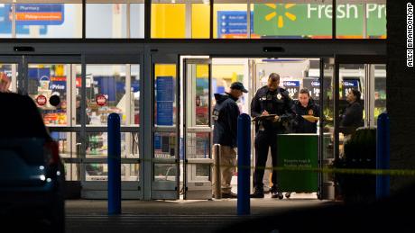 Law enforcement, including the FBI, work at the scene of a mass shooting at a Walmart, Wednesday, Nov. 23, 2022, in Chesapeake, Va.