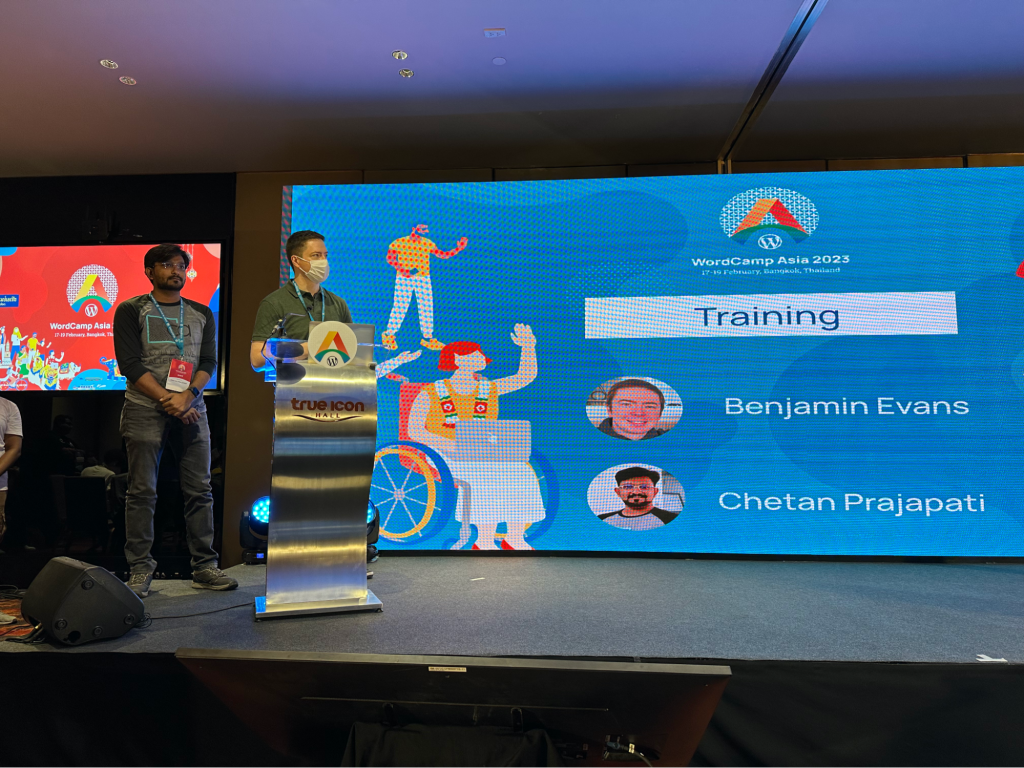 Benjamin and Chetan giving opening remarks on-stage at WordCamp Asia 2023 Contributor Day