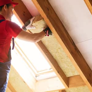 handyperson working on ceiling