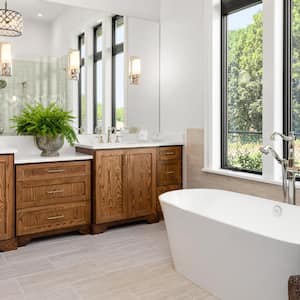 Bathroom with double vanity and bathtub