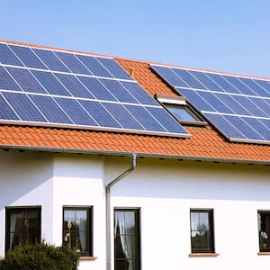 house with solar panels on roof