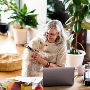 Active senior with pet dog