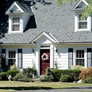 A Cape Cod style house with a steep roof