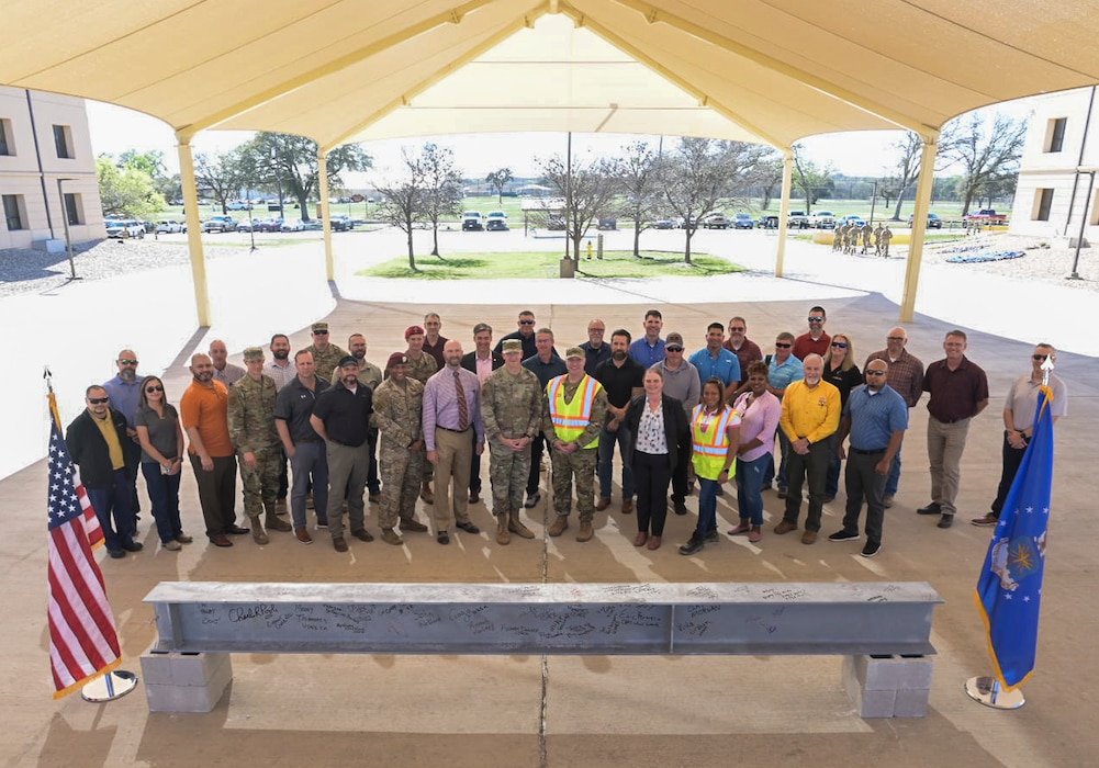 Beam signing group photo at SWTW HQ