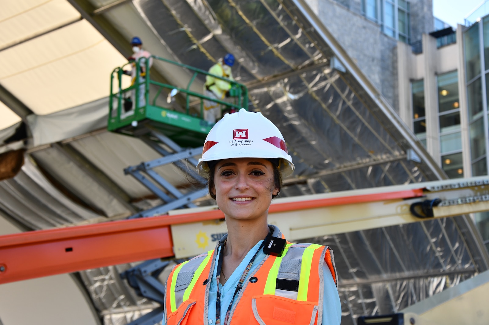 Briana Bloomer, contracting officer’s representative for the General Instruction Building Swing Space, stands in front of the project at the U.S. Military Academy at West Point, New York.