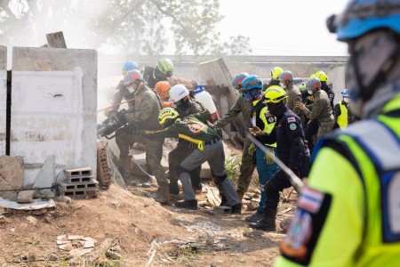 Service members from participating nations and members of the Humanitarian Assistance Disaster Relief Institute demonstrate a collapsed building rescue during Exercise Cobra Gold 2023 at the Disaster Relief Training Center in Chachoengsao province, Kingdom of Thailand, March 4, 2023. At the demonstration leaders from participating nations discussed how their nations can combine capabilities in response to regional crises. Cobra Gold, now in its 42nd year, is a Thai-U.S. co-sponsored training event that builds on the long-standing friendship between the two allied nations and brings together a robust multinational force to promote regional peace and security in support of a free and open Indo-Pacific. (U.S. Marine Corps photo by Sgt. Abrey Liggins)