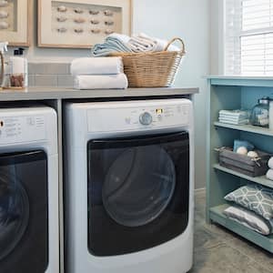 washer and dryer unit in laundry room