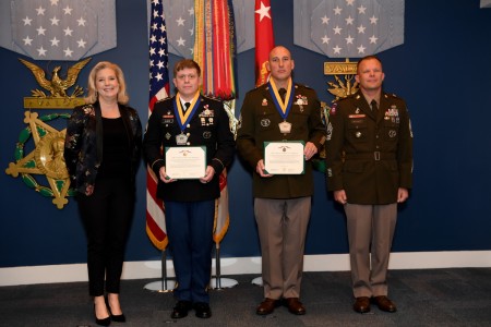 Staff Sgt. Zachary Olson and Sgt. 1st Class Antoni Bukowski are presented the Meritorious Service Medal during the Secretary of the Army Career Counselor of the year award ceremony at the Pentagon, Arlington, Va., March 31, 2023. Secretary of the Army Christine E. Wormuth hosted the event.  (U.S. Army photo by Leroy Council)