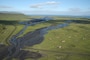 In 2008, the eruption of Mount Okmok generated a volcanic mudflow that covered a 70-acre portion of the Fort Glenn Formerly Used Defense Site on Umnak Island in Alaska. A field crew for the U.S. Army Corps of Engineers found that this lahar layer varied in depth from a few inches to as much as 4 feet in some areas during the process of removing unexploded ordnance from the site in 2020 and 2021. This issue required the team to excavate wider and deeper to ensure all munitions were safely recovered from the soil. (U.S. Army Photo)