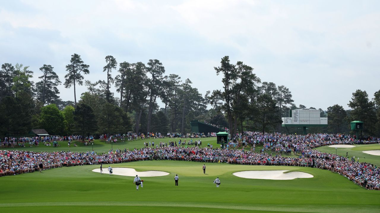 AUGUSTA, GEORGIA - APRIL 06: A general view of the second green as Tiger Woods of the United States, Xander Schauffele of the United States and Viktor Hovland of Norway walk to the green during the first round of the 2023 Masters Tournament at Augusta National Golf Club on April 06, 2023 in Augusta, Georgia. (Photo by Andrew Redington/Getty Images)