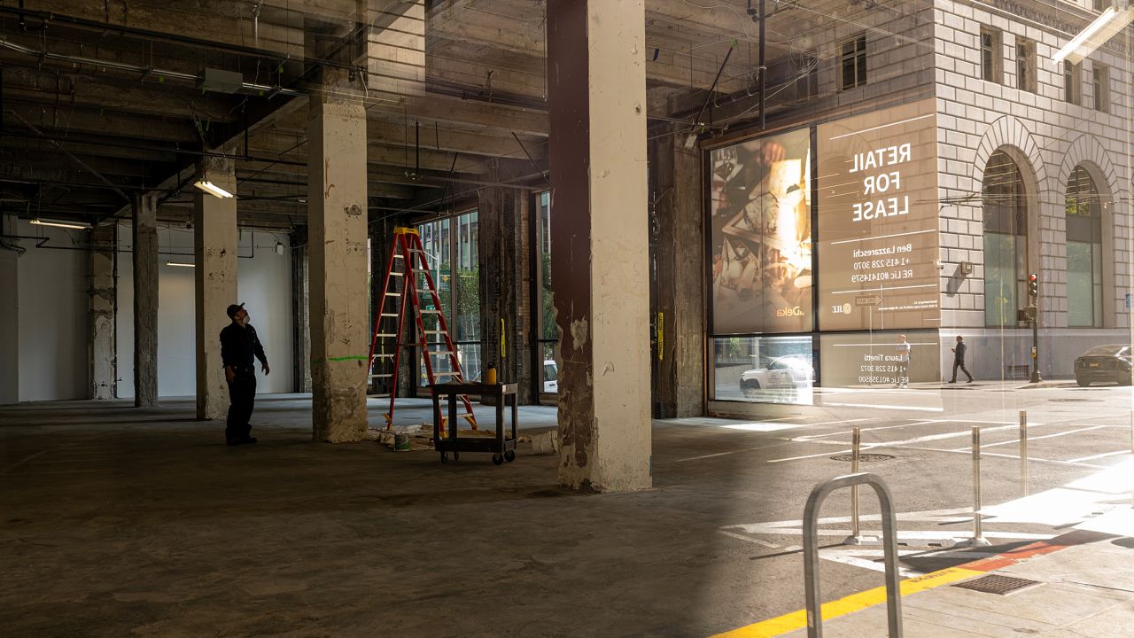 A worker inside a vacant office and retail building in San Francisco, California, US, on Monday, Oct. 10, 2022. San Francisco's office vacancies have climbed to a record and are now more than six times their pre-pandemic level, highlighting the tech hub's ongoing economic struggles. 