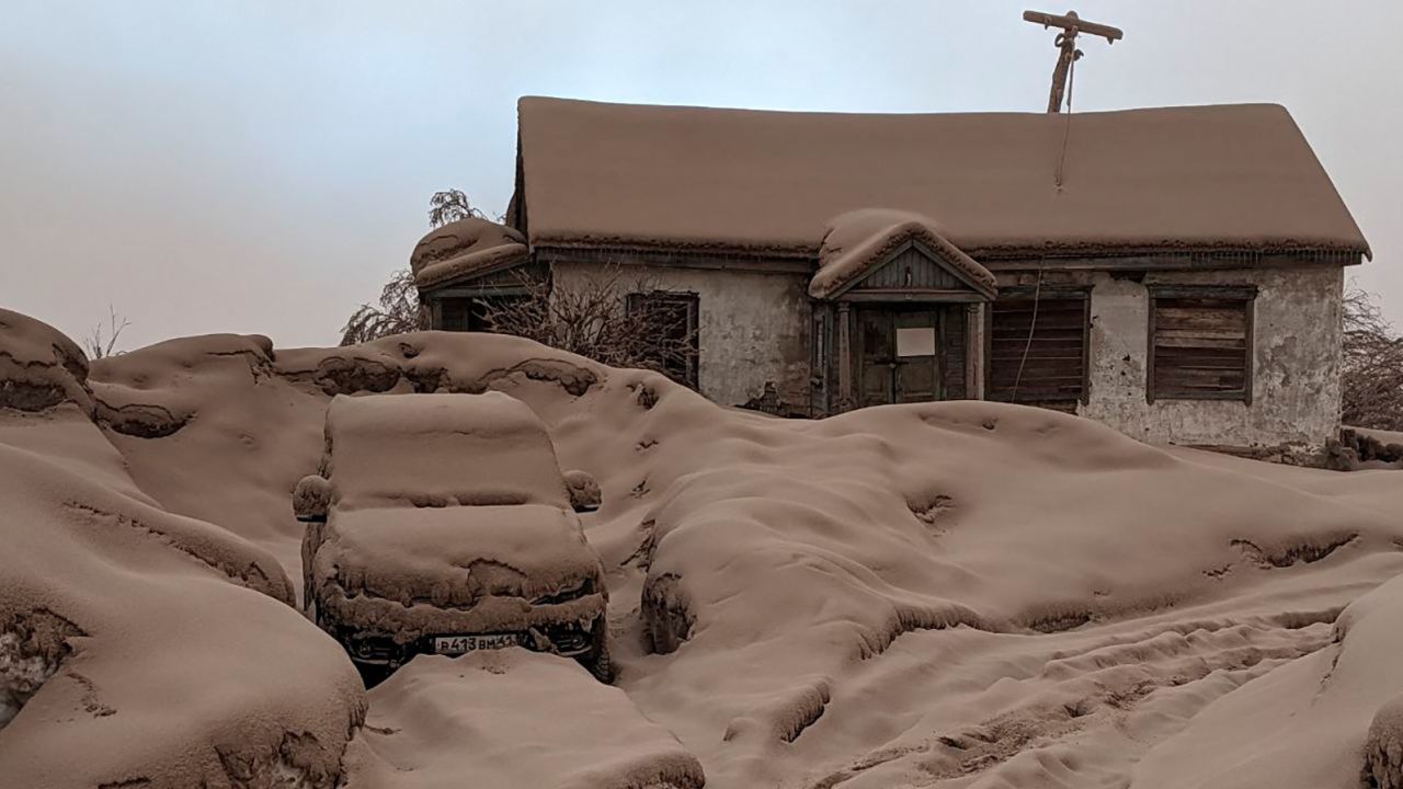 A view shows a house and a car covered in volcanic dust following the eruption of Shiveluch volcano in Kamchatka region, Russia April 11, 2023 in this picture obtained from a handout. Institute of Volcanology and Seismology/Handout via REUTERS    THIS IMAGE HAS BEEN SUPPLIED BY A THIRD PARTY MANDATORY CREDIT NO RESALES. NO ARCHIVES
