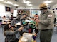 Ranger and Students Wearing Masks and Viewing Animals