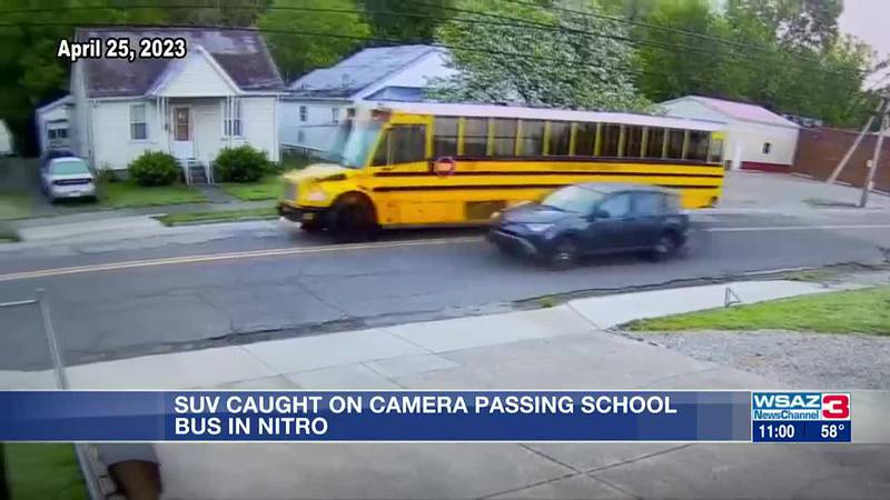 SUV caught on camera passing school bus in Nitro