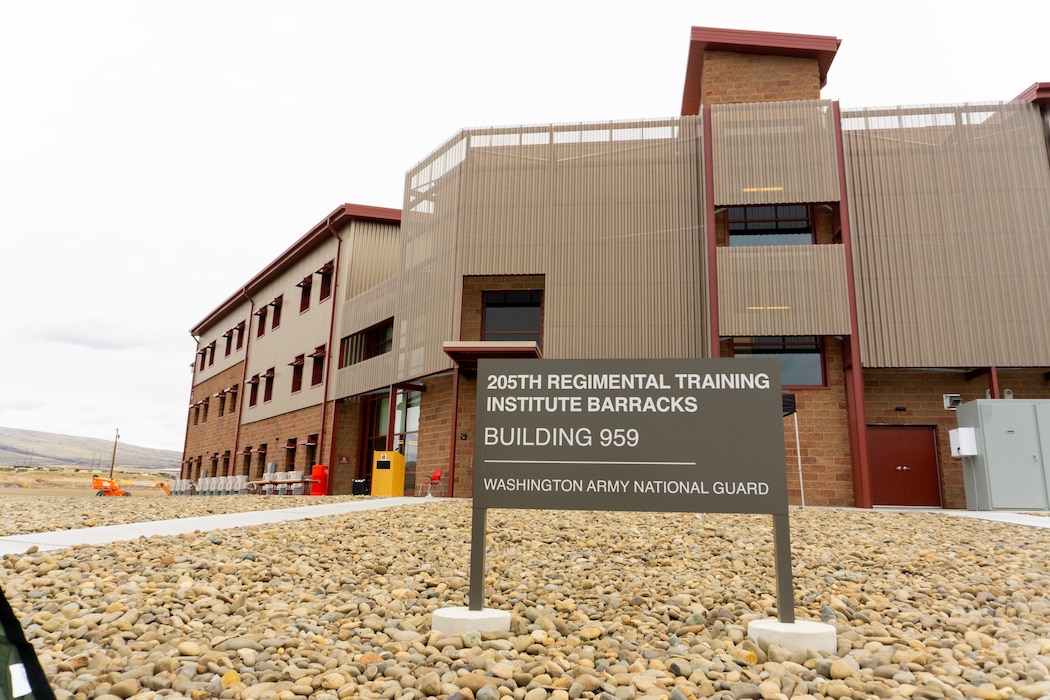 A new barracks was officially opened March 31 at Yakima Training Center with a ribbon cutting by the Washington Army National Guard and the U.S. Army Corps of Engineers, Seattle District. This 128-bed facility is dedicated for use by attendees of Total Army School System courses at the 205th Training Regiment’s Regional Training Institute.