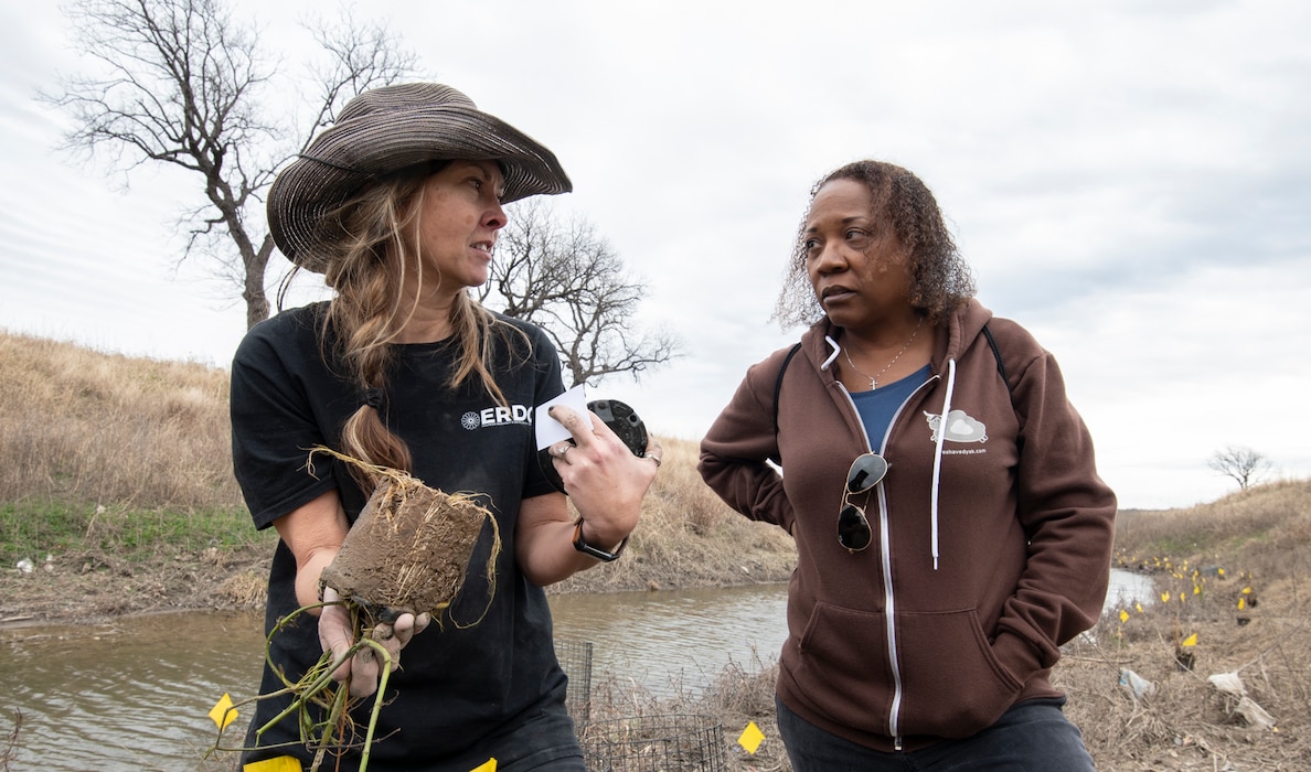 Lynde Dodd, left, a research biologist with the U.S. Army Corps of Engineers' Lewisville Aquatic Ecosystem Research Facility, talks with Karen Wright, a landscape architect with the Corps of Engineers' Fort Worth District, along the riverbanks of Sycamore Creek, a tributary of Trinty River, in Fort Worth, Texas, Jan. 20, 2023.