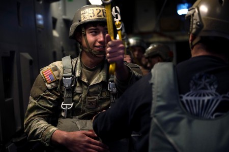 Airborne students hold their static line as they prepare for the third jump during the Basic Airborne Course at Fort Benning, Georgia, March 30. The three-week course teaches service members from every military branch how to safely conduct airborne operations.