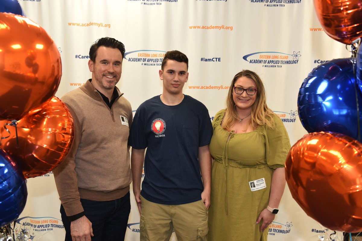 Also in the picture from the Electrical Training Center: Robert McLaughlin, Assistant Director;  Alexa Granata, Admissions Supervisor