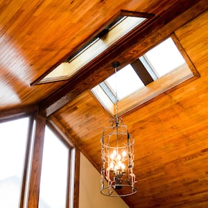 skylights in wood-covered ceiling